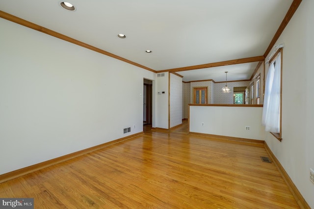 26 Rose Ln, Cherry Hill, NJ 08002 - unfurnished living room with crown molding, light wood-style floors, a chandelier, and recessed lighting