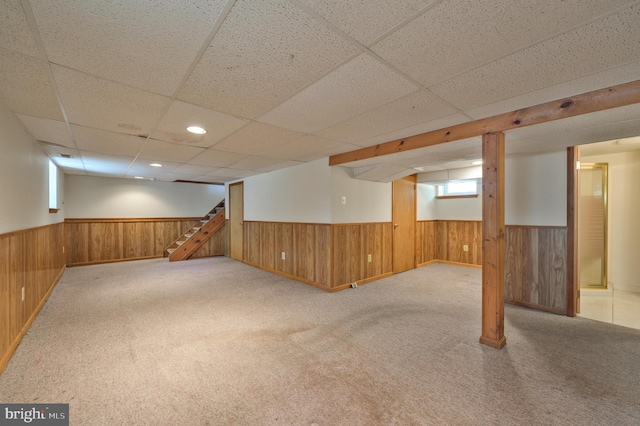26 Rose Ln, Cherry Hill, NJ 08002 - basement with a wainscoted wall, a paneled ceiling, wood walls, carpet flooring, and stairs
