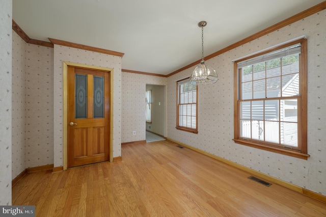 26 Rose Ln, Cherry Hill, NJ 08002 - unfurnished room featuring crown molding, a chandelier, light wood-type flooring, and wallpapered walls