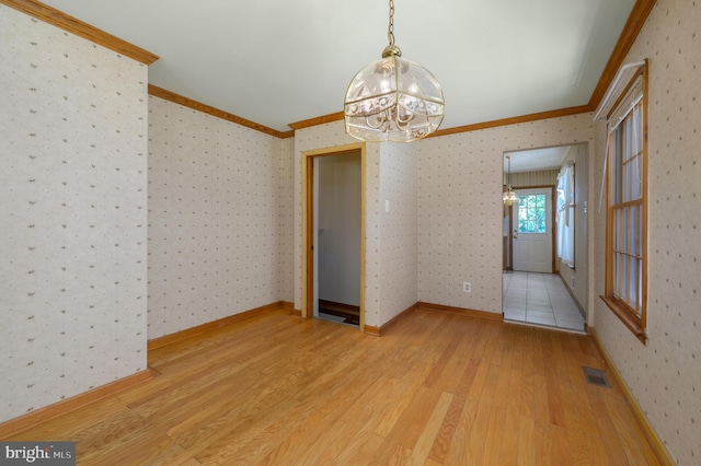 26 Rose Ln, Cherry Hill, NJ 08002 - empty room with ornamental molding, wood finished floors, a chandelier, and wallpapered walls