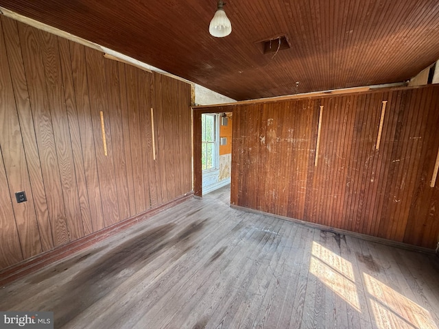 505 Battlefield Ft, Defiance, VA 24437 - unfurnished room with hardwood / wood-style floors, wooden walls, and wooden ceiling