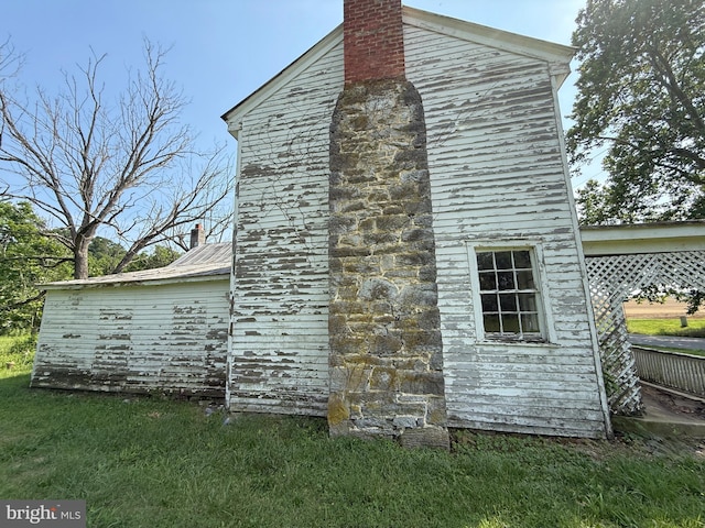 505 Battlefield Ft, Defiance, VA 24437 - view of side of home with a chimney and a lawn