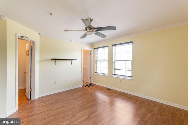 6221 Sandpiper Ct Unit 7, Elkridge, MD 21075 - unfurnished bedroom with crown molding, light wood-type flooring, and a ceiling fan