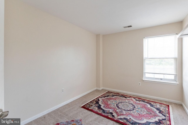 6221 Sandpiper Ct Unit 7, Elkridge, MD 21075 - carpeted empty room with baseboards