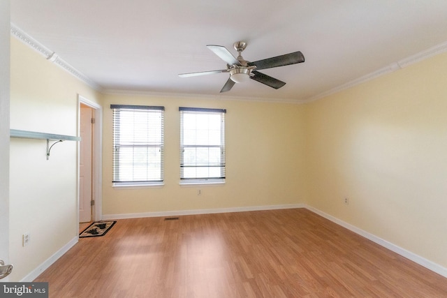 6221 Sandpiper Ct Unit 7, Elkridge, MD 21075 - unfurnished room with light wood-style floors, crown molding, and ceiling fan