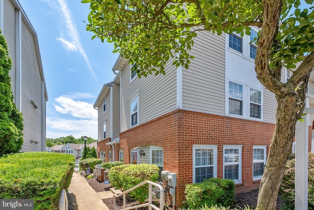 6221 Sandpiper Ct Unit 7, Elkridge, MD 21075 - view of side of property featuring brick siding