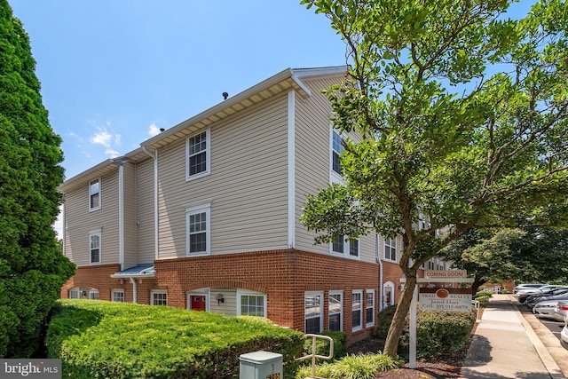 6221 Sandpiper Ct Unit 7, Elkridge, MD 21075 - view of property exterior featuring brick siding