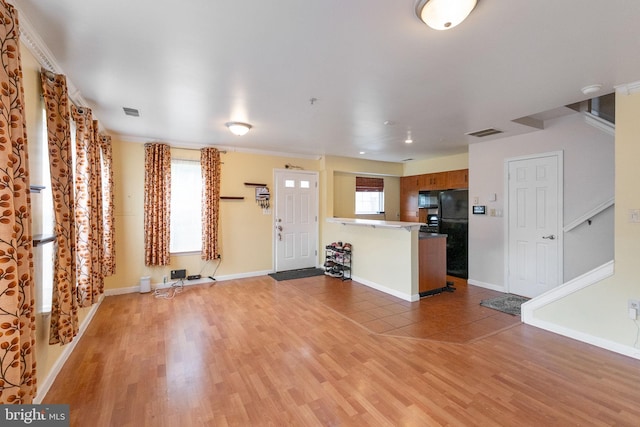 6221 Sandpiper Ct Unit 7, Elkridge, MD 21075 - unfurnished living room with light wood-style floors