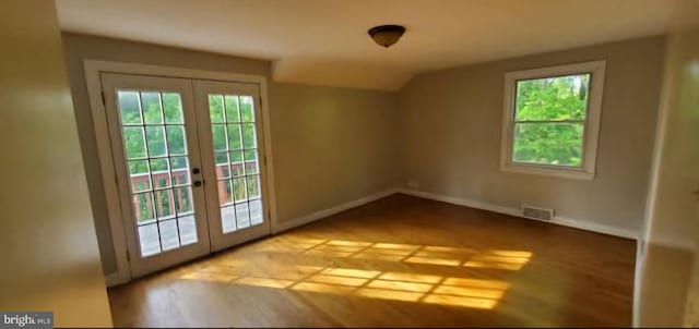 769 S Water St, Woodstock, VA 22664 - doorway with french doors, healthy amount of natural light, wood finished floors, and vaulted ceiling