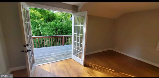 769 S Water St, Woodstock, VA 22664 - doorway with french doors, wood finished floors, and vaulted ceiling