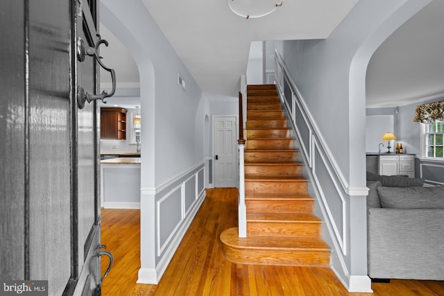 4 Haslet Way, Wilmington, DE 19807 - stairway with arched walkways and wood finished floors