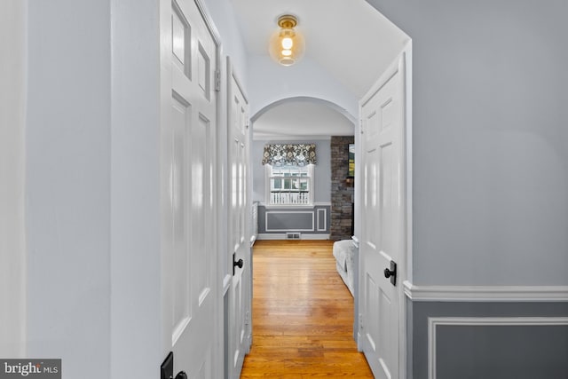 4 Haslet Way, Wilmington, DE 19807 - hall featuring arched walkways and light wood-type flooring