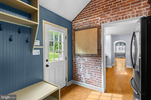 4 Haslet Way, Wilmington, DE 19807 - mudroom with lofted ceiling, light wood-style floors, and brick wall