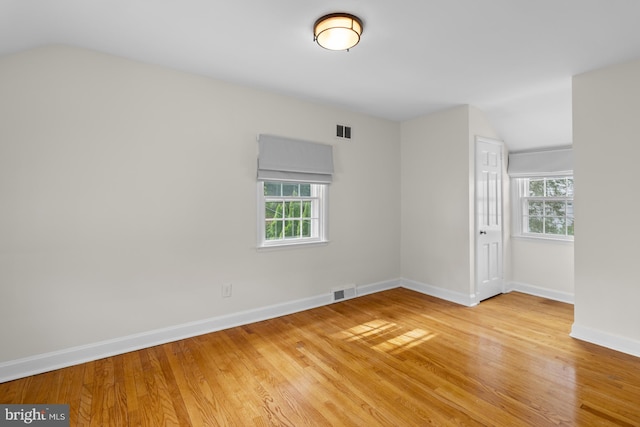 4 Haslet Way, Wilmington, DE 19807 - spare room featuring lofted ceiling and light wood-style floors