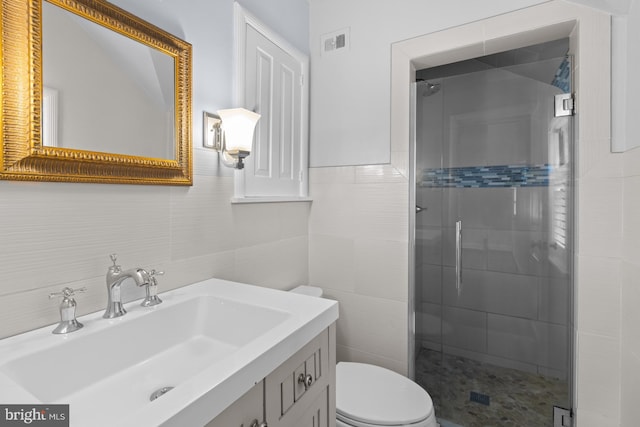 4 Haslet Way, Wilmington, DE 19807 - bathroom featuring tile walls, a stall shower, and vanity