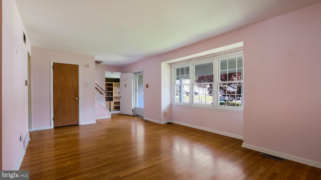 237 Louise Dr, Morrisville, PA 19067 - unfurnished room featuring wood finished floors and stairs