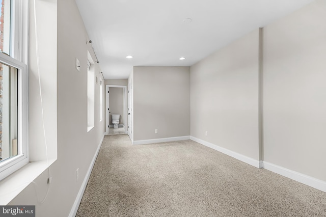 1717 Bank St, Baltimore, MD 21231 - spare room with recessed lighting and light colored carpet