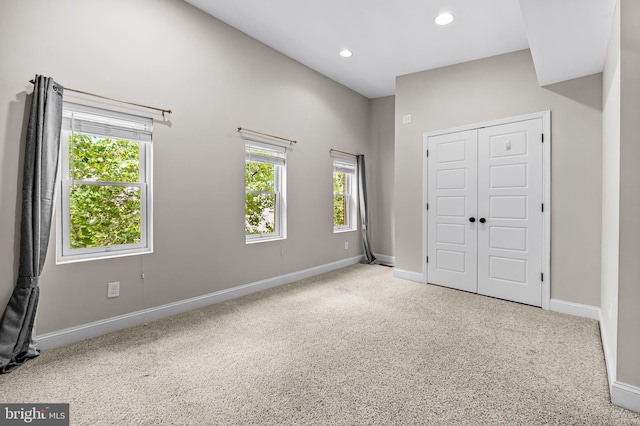1717 Bank St, Baltimore, MD 21231 - unfurnished bedroom with carpet, recessed lighting, and a closet