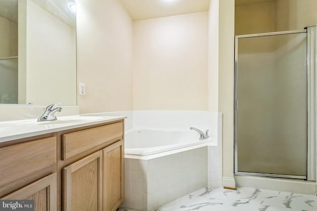 7206 Paperbark Ter, Laurel, MD 20707 - bathroom with vanity, a shower stall, a bath, and marble look tiles