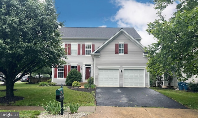 10024 Darnaway Ct, Bristow, VA 20136 - view of front facade featuring driveway and a garage