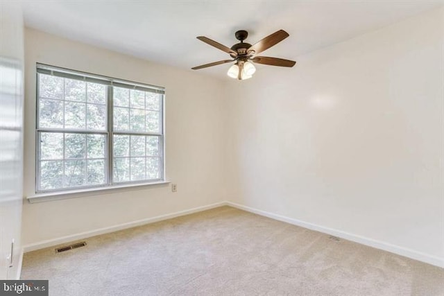 15246 Streamside Ct, Dumfries, VA 22025 - carpeted spare room featuring baseboards and a ceiling fan