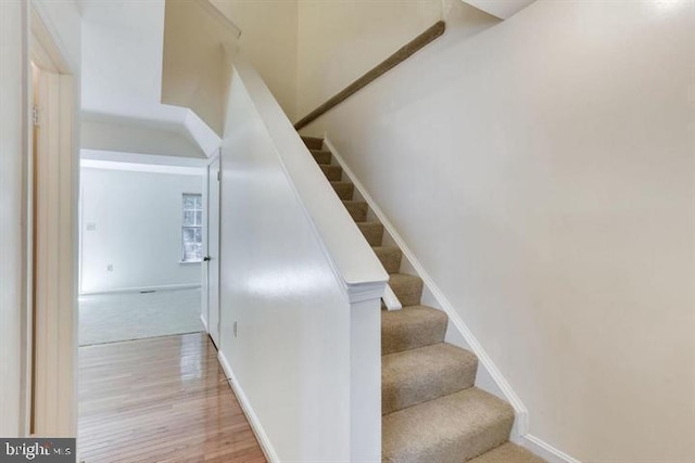 15246 Streamside Ct, Dumfries, VA 22025 - staircase featuring wood finished floors and baseboards