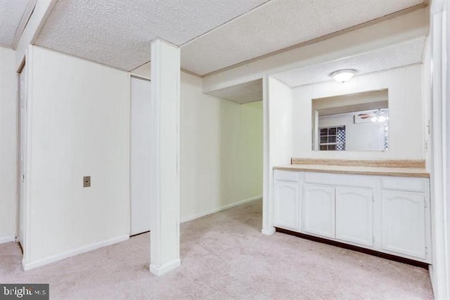 15246 Streamside Ct, Dumfries, VA 22025 - below grade area with light colored carpet, ceiling fan, and a textured ceiling