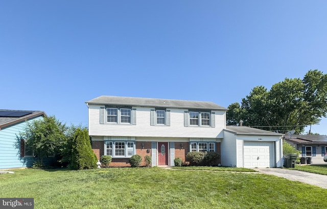 35 Gentry Ln, Willingboro, NJ 08046 - colonial house with a garage, concrete driveway, brick siding, and a front yard
