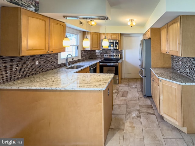 35 Gentry Ln, Willingboro, NJ 08046 - kitchen with appliances with stainless steel finishes, decorative backsplash, light stone counters, a peninsula, and hanging light fixtures