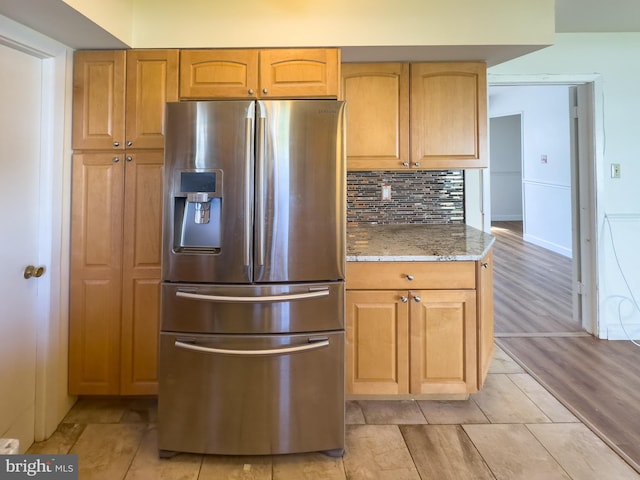 35 Gentry Ln, Willingboro, NJ 08046 - kitchen featuring stainless steel fridge with ice dispenser, tasteful backsplash, and light stone counters