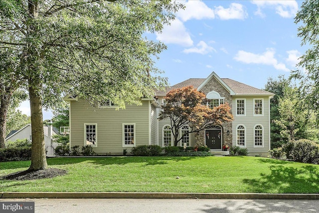 4 William Howard Dr, Glen Mills, PA 19342 - view of front of house with a front yard and stone siding