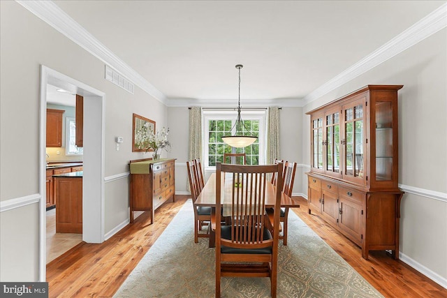 4 William Howard Dr, Glen Mills, PA 19342 - dining space with light wood finished floors and ornamental molding