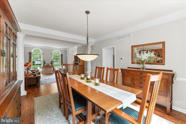 4 William Howard Dr, Glen Mills, PA 19342 - dining space featuring dark wood-style flooring and crown molding