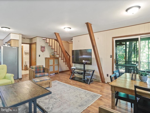 13 Mountainside Dr, Berkeley Springs, WV 25411 - living area featuring light wood-style floors and stairway