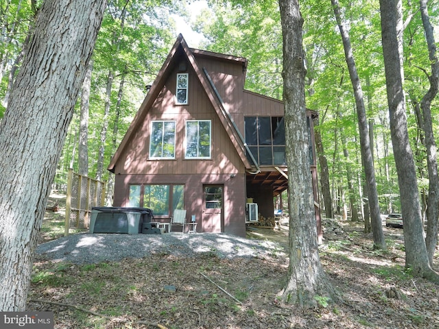 13 Mountainside Dr, Berkeley Springs, WV 25411 - view of front of property with a hot tub and a sunroom