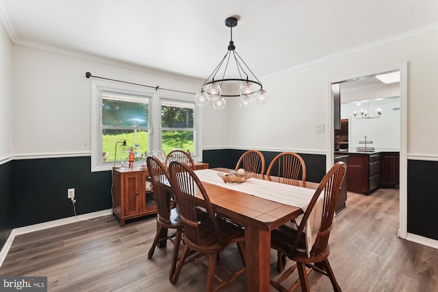 12116 Long Ridge Ln, Bowie, MD 20715 - dining room with a chandelier, light wood-type flooring, and crown molding