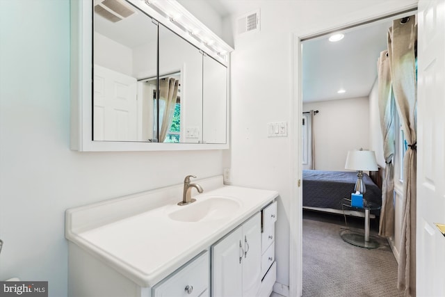 12116 Long Ridge Ln, Bowie, MD 20715 - ensuite bathroom with vanity and recessed lighting