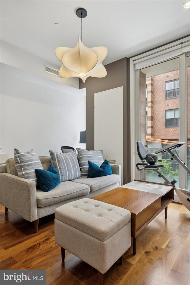 621 S 24th St Unit 204, Philadelphia, PA 19146 - living room featuring wood finished floors