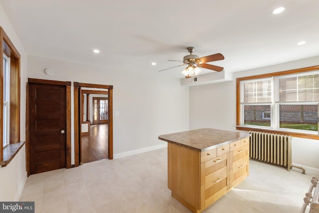 313 W 5th Ave, Conshohocken, PA 19428 - kitchen with radiator heating unit, recessed lighting, a ceiling fan, a center island, and light brown cabinets