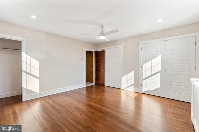 313 W 5th Ave, Conshohocken, PA 19428 - unfurnished bedroom featuring wood finished floors, multiple closets, a ceiling fan, and recessed lighting