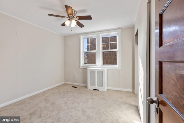313 W 5th Ave, Conshohocken, PA 19428 - carpeted empty room featuring radiator, ceiling fan, and crown molding