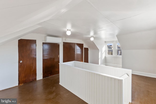 313 W 5th Ave, Conshohocken, PA 19428 - additional living space featuring vaulted ceiling, wood finished floors, and a wall mounted air conditioner