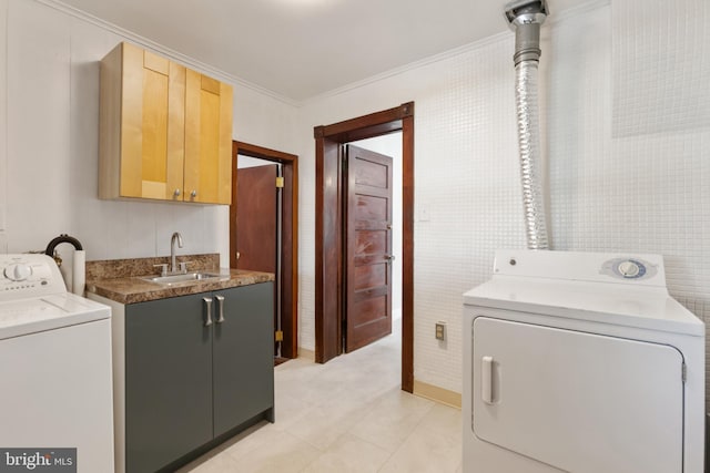 313 W 5th Ave, Conshohocken, PA 19428 - washroom featuring cabinet space, crown molding, light tile patterned floors, separate washer and dryer, and bar with sink