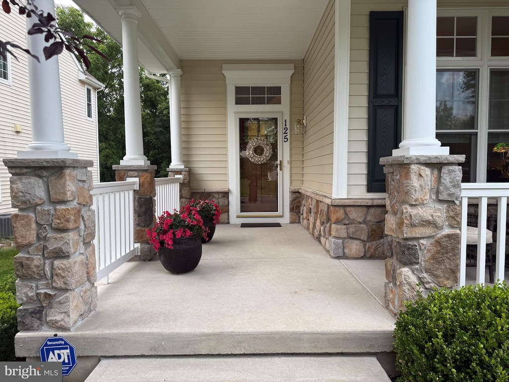 125 Starboard Way, Mount Laurel, NJ 08054 - doorway to property featuring a porch and stone siding