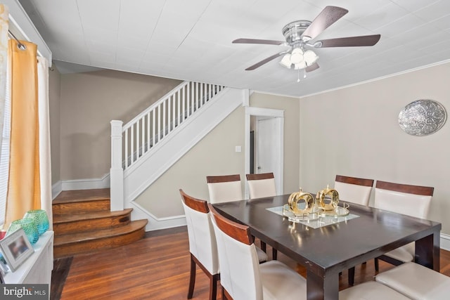1511 Palm St, Reading, PA 19604 - dining space with wood finished floors, stairs, and a ceiling fan
