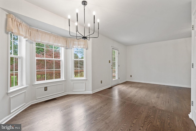 14057 Broadview Ln, Culpeper, VA 22701 - unfurnished dining area featuring a chandelier, wood finished floors, and plenty of natural light