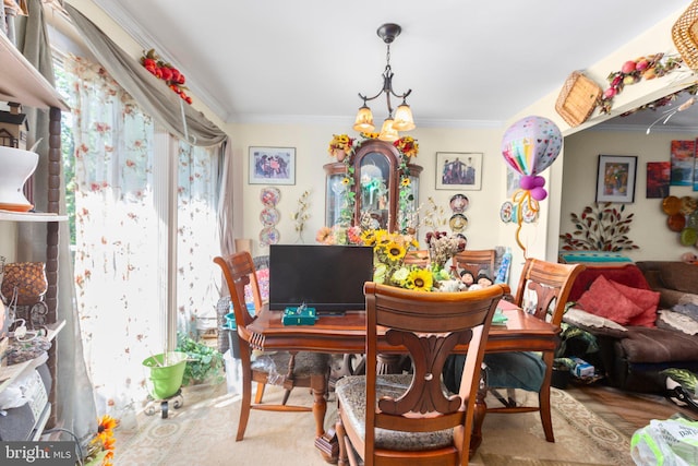 5955 Plumwood Ln, Woodbridge, VA 22193 - dining space featuring crown molding and a chandelier