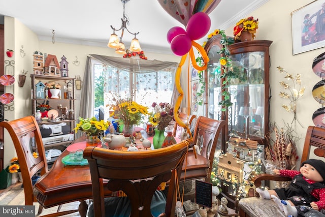 5955 Plumwood Ln, Woodbridge, VA 22193 - dining space featuring a chandelier and crown molding