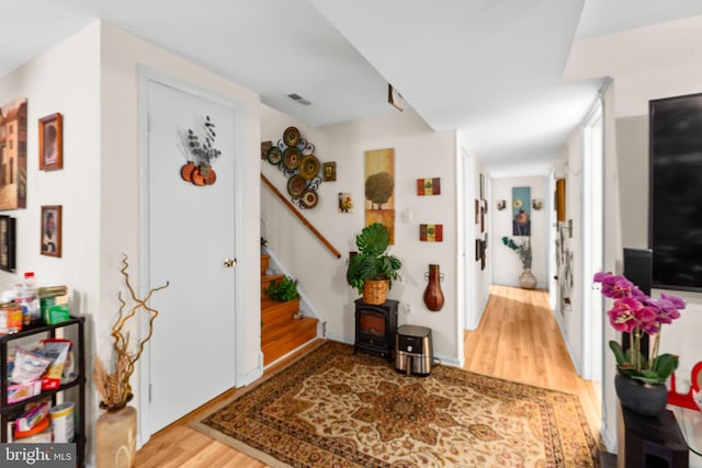 5955 Plumwood Ln, Woodbridge, VA 22193 - entryway with wood finished floors and stairs