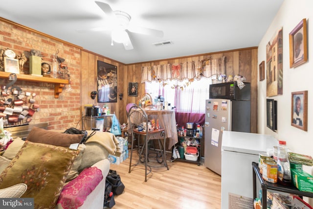5955 Plumwood Ln, Woodbridge, VA 22193 - living area with ceiling fan and wood finished floors